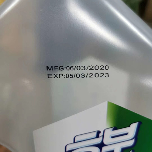 Date Coder Machine on Plastic Bottle